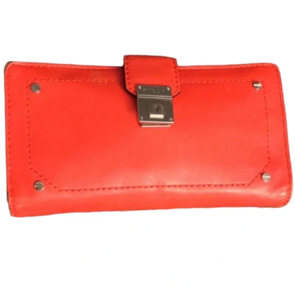 Milly wristlet orange mobile wallet front snap ,zip  lots of pockets